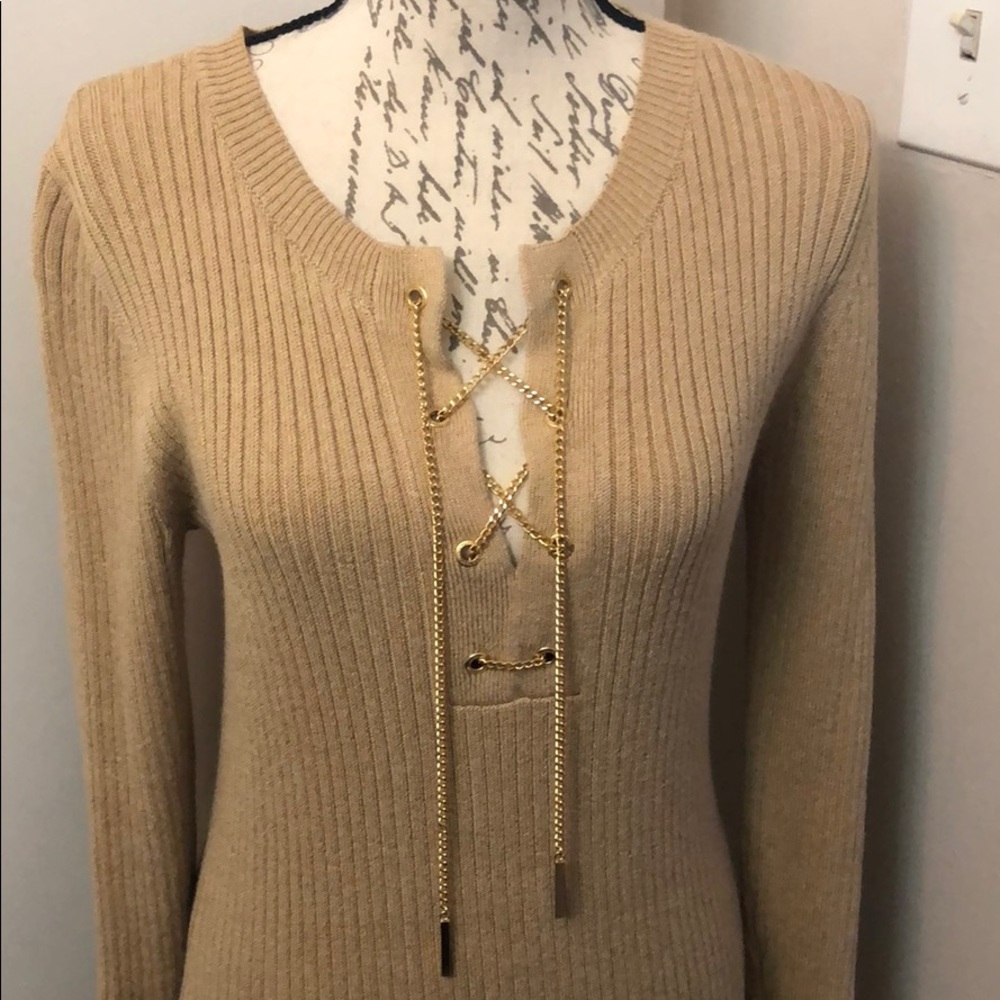 Gold dress with gold chains tie up around neck